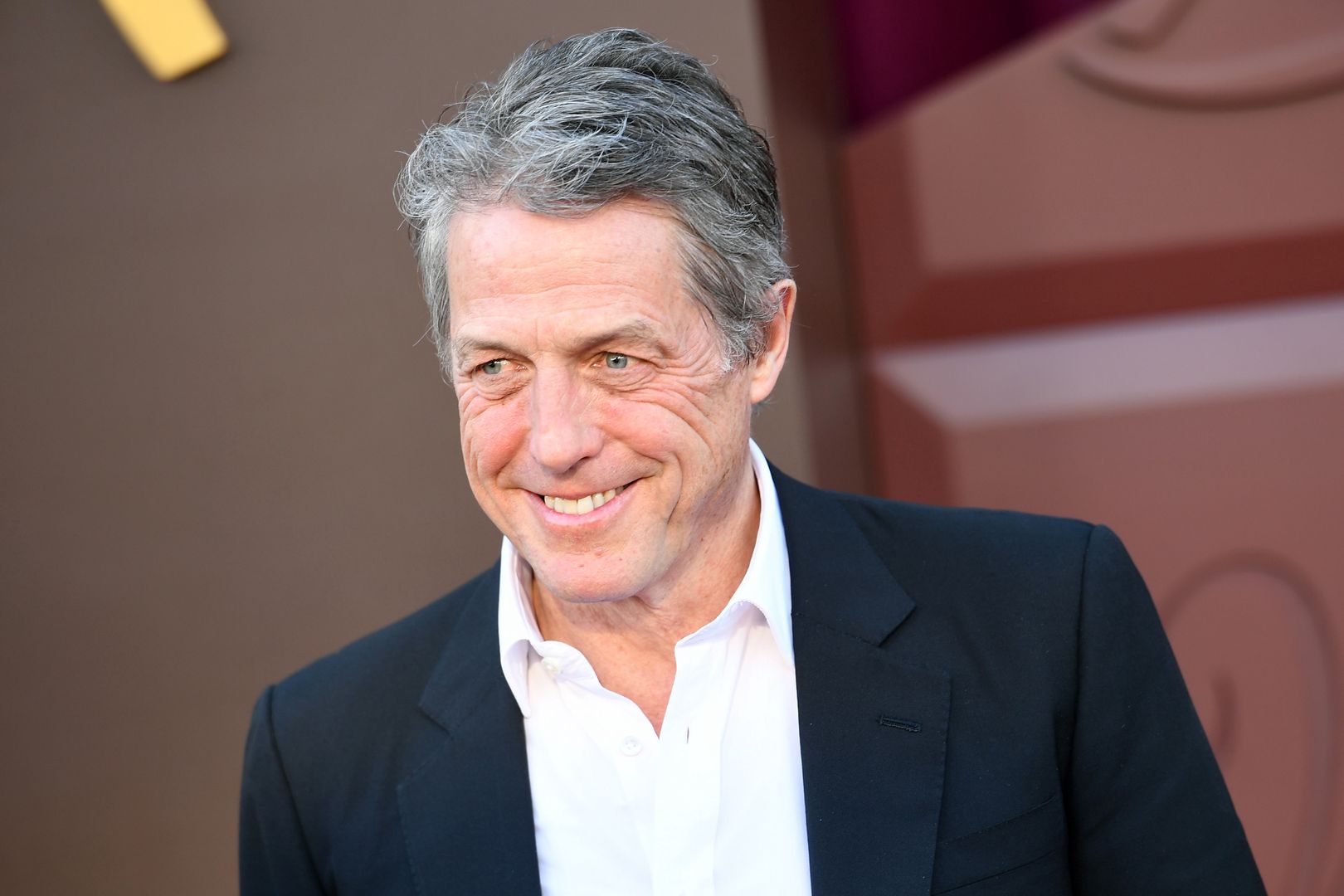 Hugh Grant's turbulent love life and fatherhood revelations