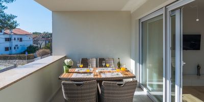 Family Apartman pro 4 os. se 2 ložnicemi s částečným výhledem na moře - Apartment Martan Vir, foto 1