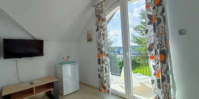 Pokoj s balkónem s koupelnou s manželskou postelí - Willa Albatros Mielno, foto 1