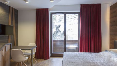 Apartament 2-osobowy na piętrze z własną kuchnią z 1 pomieszczeniem sypialnianym