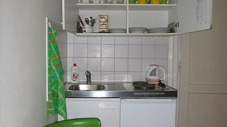 Pokój 4-osobowy z prysznicem z własną kuchnią