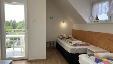 Apartament 5-osobowy na poddaszu z klimatyzacją z 3 pomieszczeniami sypialnianymi