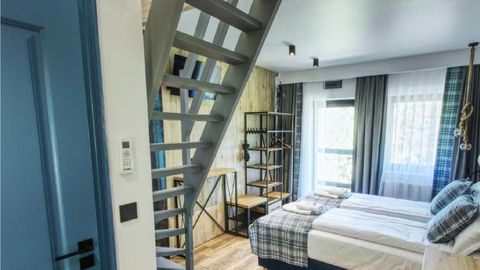 Apartament 4-osobowy na piętrze z antresolą z 2 pomieszczeniami sypialnianymi