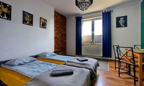 Przestronny Apartament z Trzema Sypialniami Centrum Torunia