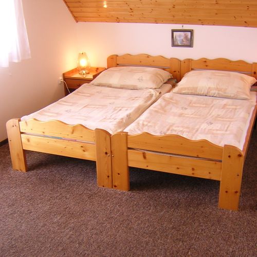 Apartament 4-osobowy na poddaszu z balkonem z 2 pomieszczeniami sypialnianymi
