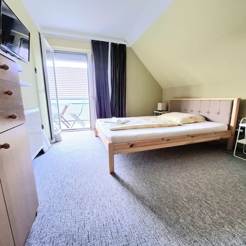 Rodinný Apartman s balkónem pro 4 os. se 2 ložnicemi (s možností přistýlky)