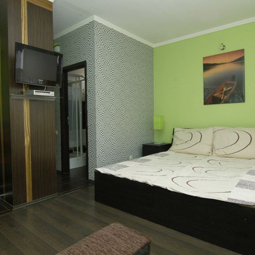 Apartament queen cu grădină cu 1 camera pentru 2 pers. (se poate solicita pat suplimentar)