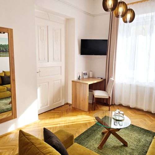 Rodinný Pokoj pro 3 os. s výhledem do zahrady (s možností přistýlky)