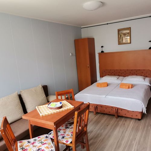 Apartament 3-osobowy na parterze z widokiem na ogród z 1 pomieszczeniem sypialnianym