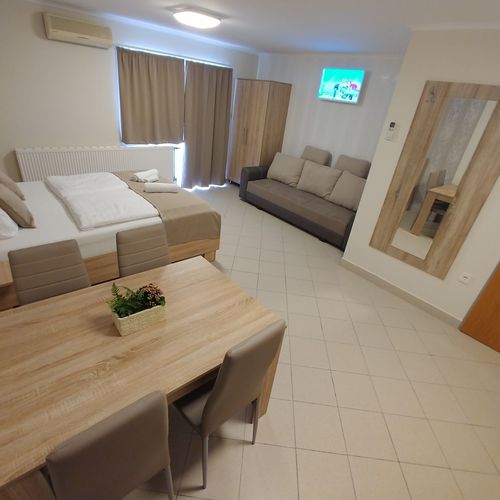 Apartament 4-osobowy Oferta dla dwóch dorosłych+ dwoje dzieci z balkonem z 1 pomieszczeniem sypialnianym