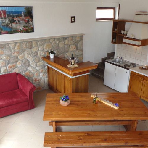 Apartament la parter cu grădină cu 1 camera pentru 2 pers. (se poate solicita pat suplimentar)