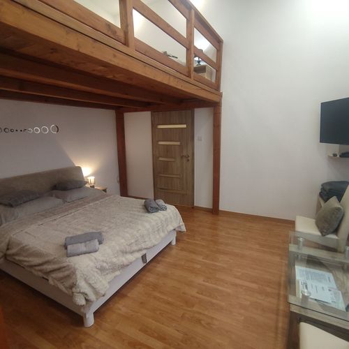 Apartament maisonetă cu aer condiționat cu 1 camera pentru 4 pers. (se poate solicita pat suplimentar)