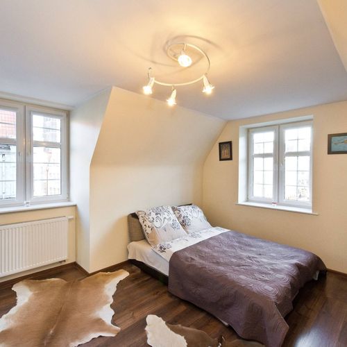 Apartament 4-osobowy na poddaszu na poddaszu z 2 pomieszczeniami sypialnianymi