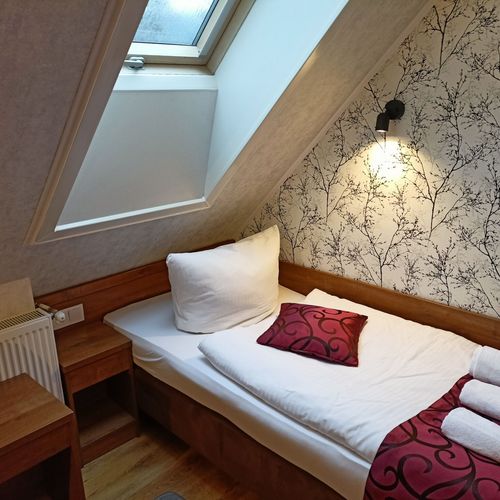 Apartament 4-osobowy na poddaszu z wanną z 2 pomieszczeniami sypialnianymi