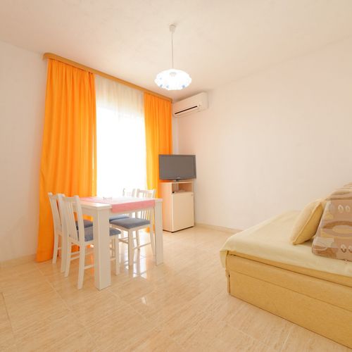 Apartament 4-osobowy na parterze "A" z 2 pomieszczeniami sypialnianymi