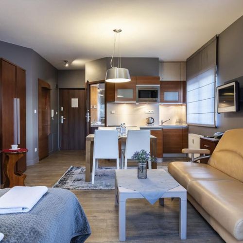 Apartament 4-osobowy na parterze z tarasem z 1 pomieszczeniem sypialnianym