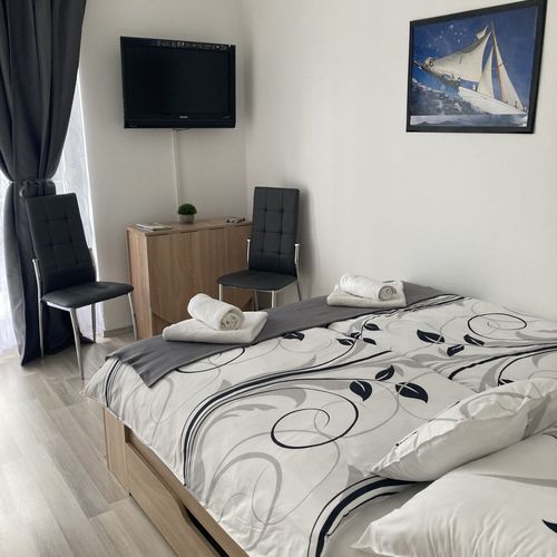 Apartament 4-osobowy na piętrze z klimatyzacją z 2 pomieszczeniami sypialnianymi