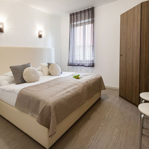 Apartman pro 4 os. se 2 ložnicemi s výhledem do zahrady přízemní