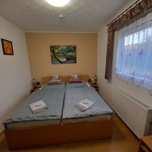 Apartament 3-osobowy with private bathroom z widokiem na ogród z 1 pomieszczeniem sypialnianym