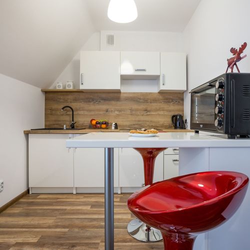 Apartament 8-osobowy na poddaszu Deluxe z 3 pomieszczeniami sypialnianymi