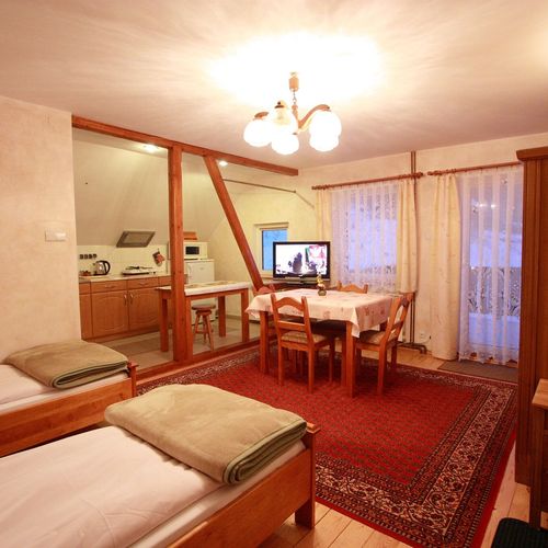 Apartament cu vedere spre munte cu vedere spre grădină cu 2 camere pentru 4 pers. (se poate solicita pat suplimentar)