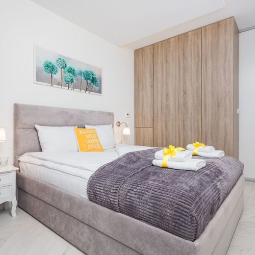 Apartament 4-osobowy z balkonem z klimatyzacją z 2 pomieszczeniami sypialnianymi