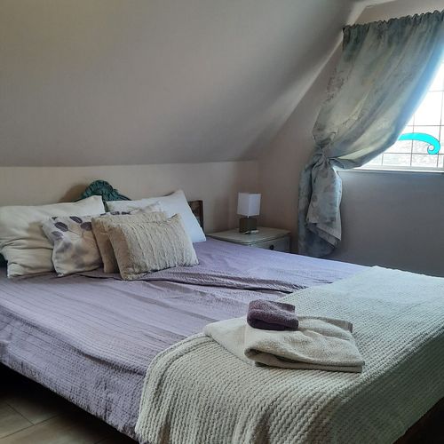 Apartament 4-osobowy na poddaszu z widokiem na miasto z 2 pomieszczeniami sypialnianymi (możliwa dostawka)