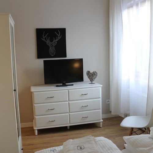 Apartament 4-osobowy z tarasem z 2 pomieszczeniami sypialnianymi