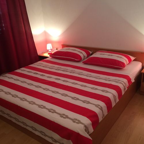 Apartament 4-osobowy na parterze z tarasem z 2 pomieszczeniami sypialnianymi