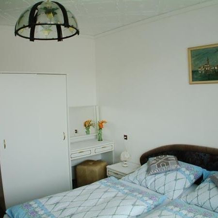 Apartament 4-osobowy z balkonem z prysznicem z 2 pomieszczeniami sypialnianymi