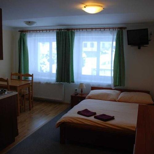 Apartament 2-osobowy z prysznicem z aneksem kuchennym (możliwa dostawka)
