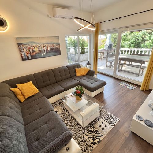 Apartament 5-osobowy na parterze z tarasem z 3 pomieszczeniami sypialnianymi