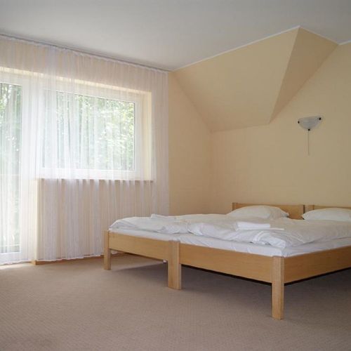 Apartament 4-osobowy z 2 pomieszczeniami sypialnianymi (możliwa dostawka)