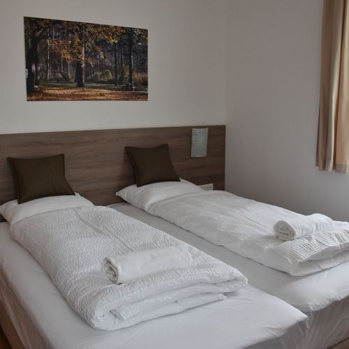Apartament 4-osobowy z 2 pomieszczeniami sypialnianymi (możliwa dostawka)