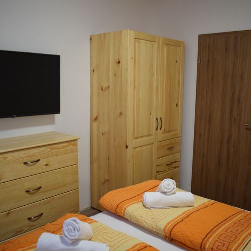 Apartament 2-osobowy na parterze "A" z 1 pomieszczeniem sypialnianym