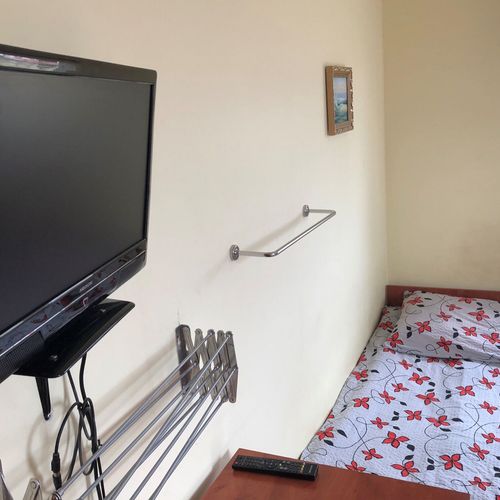 Camera tripla cu baie comună cu chicinetă comună