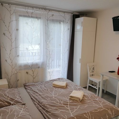 Studio Pokoj s terasou s manželskou postelí