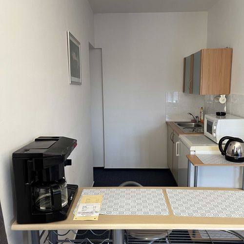 Apartament la mansardă cu chicinetă proprie cu 2 camere pentru 4 pers.