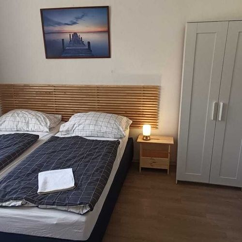 Pokoj se společnou koupelnou  pro 2 os.