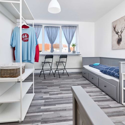 Apartman se sprchou s privátní koupelnou mimo apartmán s manželskou postelí s 1 ložnicí