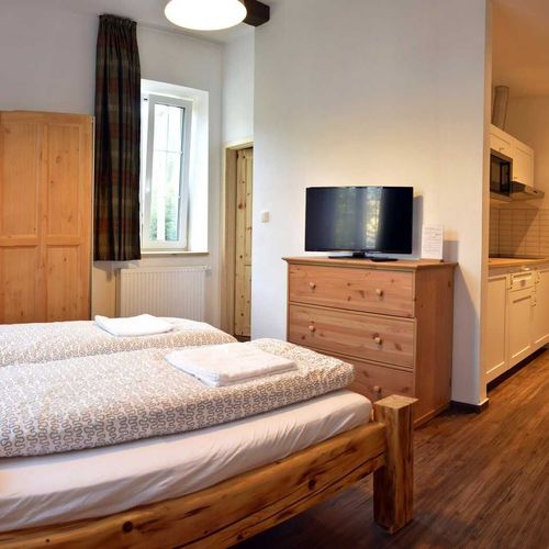 Apartament 2-osobowy z prysznicem z aneksem kuchennym (możliwa dostawka)