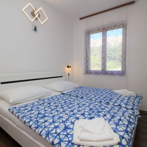 Apartament 4-osobowy na parterze z klimatyzacją z 2 pomieszczeniami sypialnianymi (możliwa dostawka)