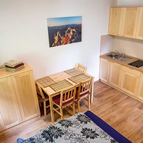Apartman s vlastní kuchyňkou pro 4 os. se 2 ložnicemi s výhledem na les