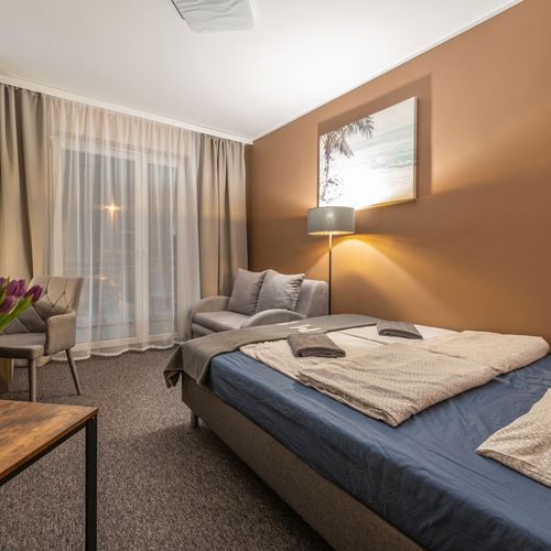 Pokój 3-osobowy na parterze z balkonem