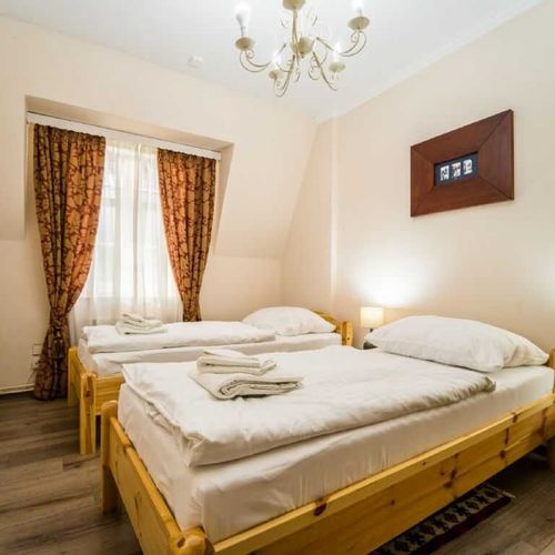 Apartament cu duș cu chicinetă proprie cu 2 camere pentru 4 pers.