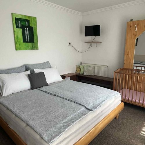 Apartament 10-osobowy Przyjazny podróżom rodzinnym z dostępem do ogrodu (możliwa dostawka)