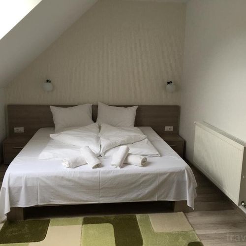 Apartament mansardă cu 2 camere pentru 4 pers. (se poate solicita pat suplimentar)