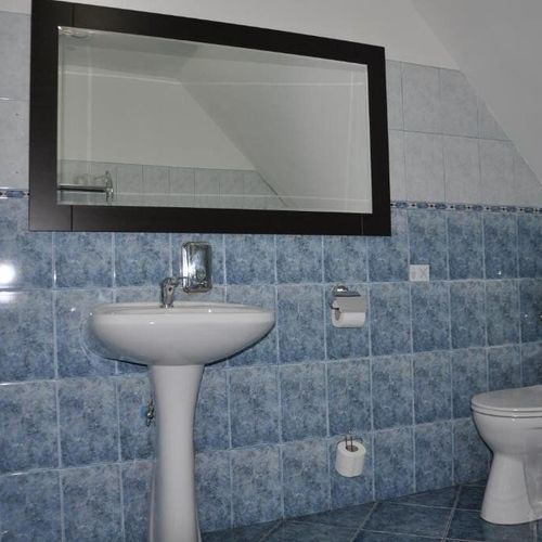 Camera dubla superior la mansardă