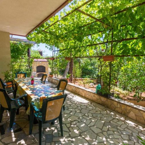 Apartament 5-osobowy na parterze z widokiem na ogród z 2 pomieszczeniami sypialnianymi