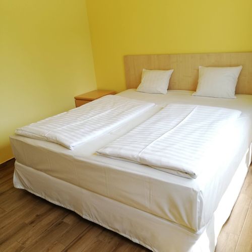 Apartament 4-osobowy "D" z 2 pomieszczeniami sypialnianymi